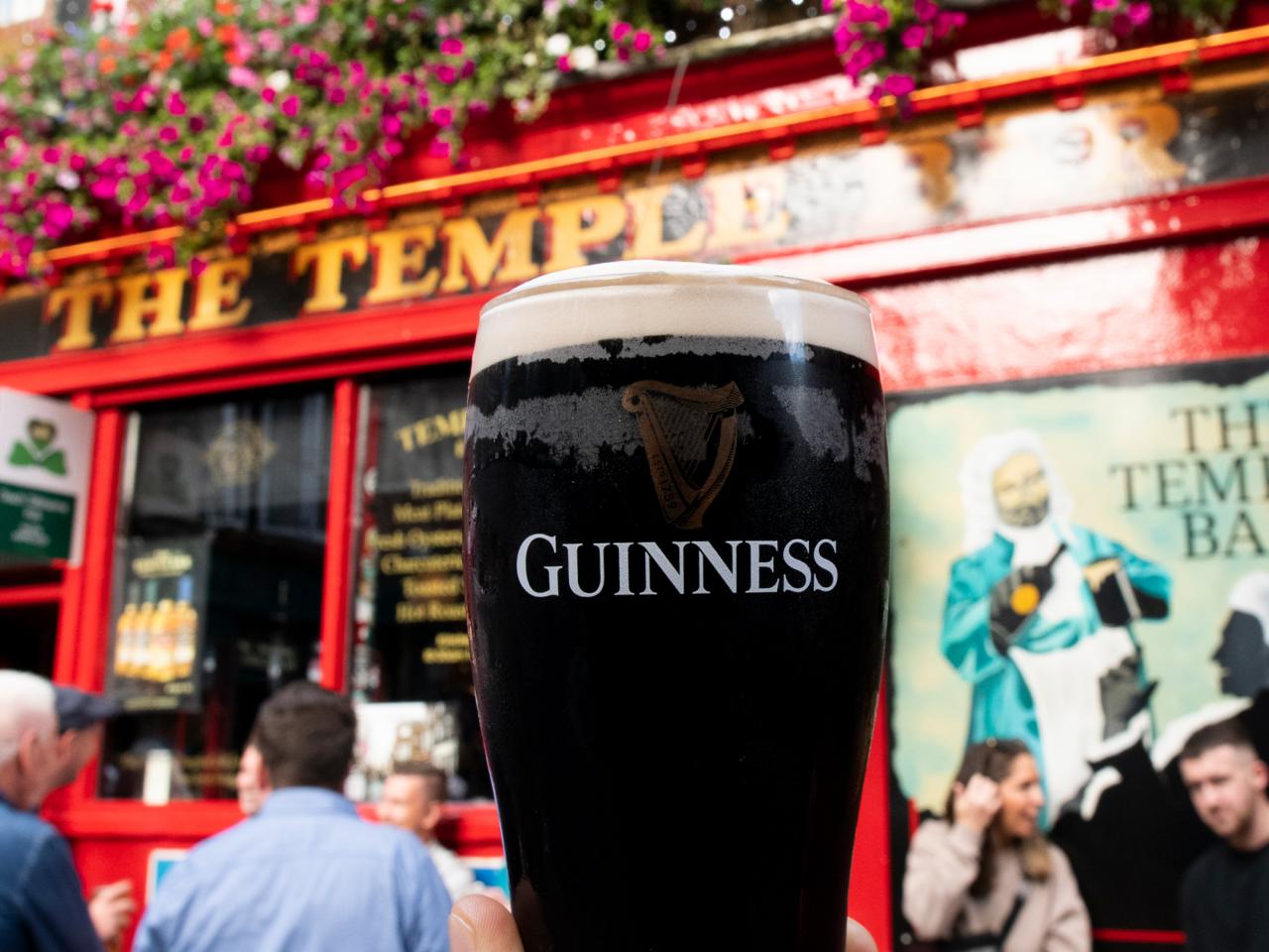 A Guinness dark Irish dry stout beer glass that originated in the