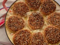 This dish is the perfect combination of Molly and her husband, Nick. It&rsquo;s technically a hotdish but the bagel-y flavors are inspired by New York, where they met and started dating. It's a creamy pot pie-like filling all tucked underneath a bed of fluffy chive-speckled buttermilk biscuits.