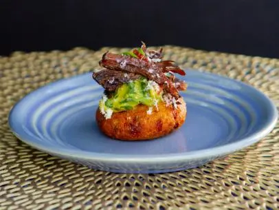 Lorena Garcia’s Wagyu Short Rib “Asado Negro Style” with Arepitas, as seen on Guy's Ranch Kitchen Season 6.