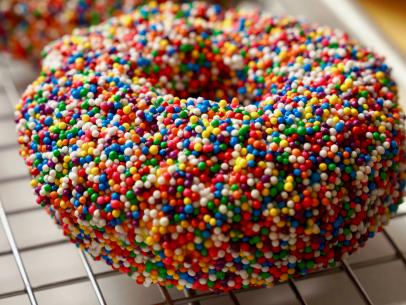 Beauty shot of Molly Yeh's Sprinkle Cake Donuts, as seen on Girl Meets Farm Season 12.