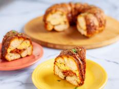 Monkey bread is traditionally a pull-apart sweet treat, baked in a Bundt pan. Ree has created this delicious savory breakfast version, incorporating bacon, scrambled eggs, herbs and cheese.