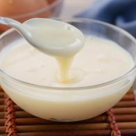 condensed milk in a bowl close up