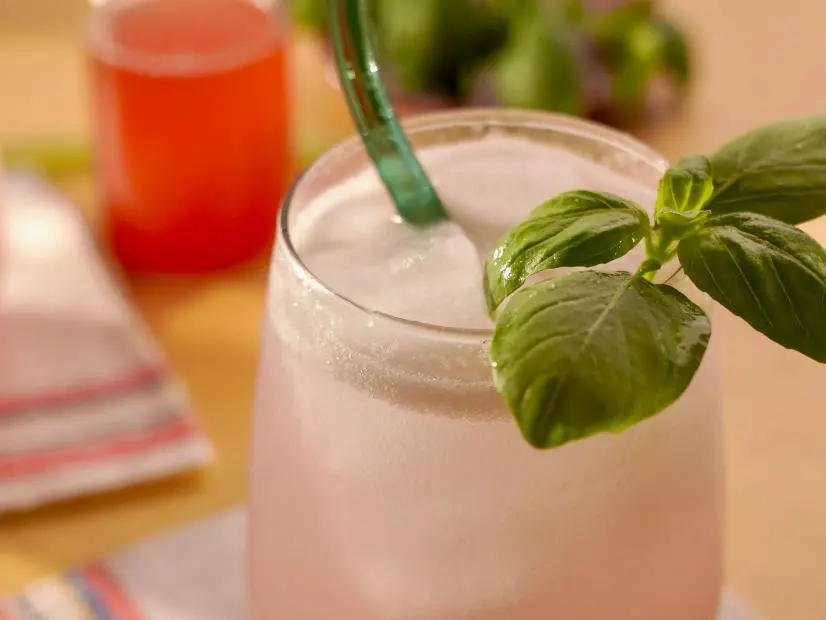 Beauty shot of Molly Yeh's Rhubarb Basil Shrub, as seen on Girl Meets Farm Season 12.