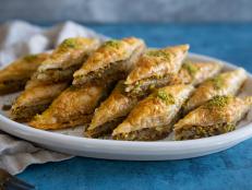 Baklava can be filled with any nut, but this one celebrates the pistachio. Without too many ingredients, this recipe is a boon to new bakers and a wonderful way to let the flavor of the pistachio shine through.