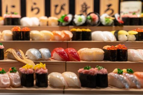 https://food.fnr.sndimg.com/content/dam/images/food/fullset/2023/3/23/maki-and-nigiri-on-sushi-stand-japanese-restaurant.jpg.rend.hgtvcom.476.317.suffix/1679607791614.jpeg