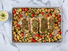 Sheet-pan suppers are simple and casual, but that doesn&rsquo;t mean they can&rsquo;t be a little bit fancy. This baked salmon with a jazzed-up mayonnaise looks impressive and tastes fantastic. Even better, it&rsquo;s ready in less than 30 minutes.