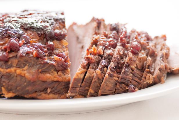braised brisket made for Passover feast holiday with craberry topping