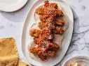 Lasagna Fritta, Kosher salt, lasagna noodles, vegetable oil, ground beef, marinara sauce, ricotta, mozzarella, Parmesan, all-purpose flour, garlic powder, milk or water, eggs, Italian breadcrumbs, alfredo sauce