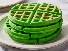 Vietnamese pandan waffles (bánh kẹp lá dứa) are a popular street food that are best eaten when they are fresh out of the waffle iron. A mix of tapioca starch, rice flour and all-purpose flour creates a fluffy and chewy interior tucked underneath a super crispy crust. Unlike most American-style waffles, this green-hued version is sweet enough on its own (thanks to the generous amount of sugar and coconut milk in the batter) so there is no need for any syrup or toppings. Pandan extract can range greatly in potency depending on the brand, so start with 2 teaspoons and add more until the coconut mixture is bright green and extremely fragrant.