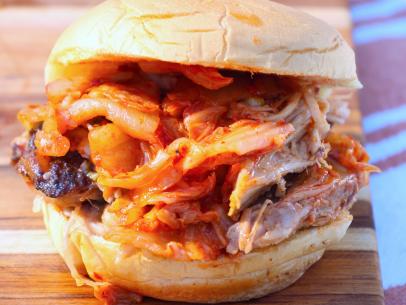 Pulled Pork Sandwich with Sweet and Spicy Korean BBQ Sauce and Kimchi, as seen on Symon's Dinners Cooking Out, Season 4.