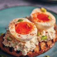 Boiled Eggs with Cottage Cheese on a Toasted Slice of Brown Bread