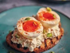 Boiled Eggs with Cottage Cheese on a Toasted Slice of Brown Bread