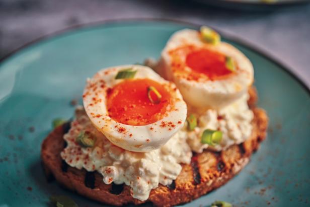 Boiled Eggs with Cottage Cheese on a Toasted Slice of Brown Bread