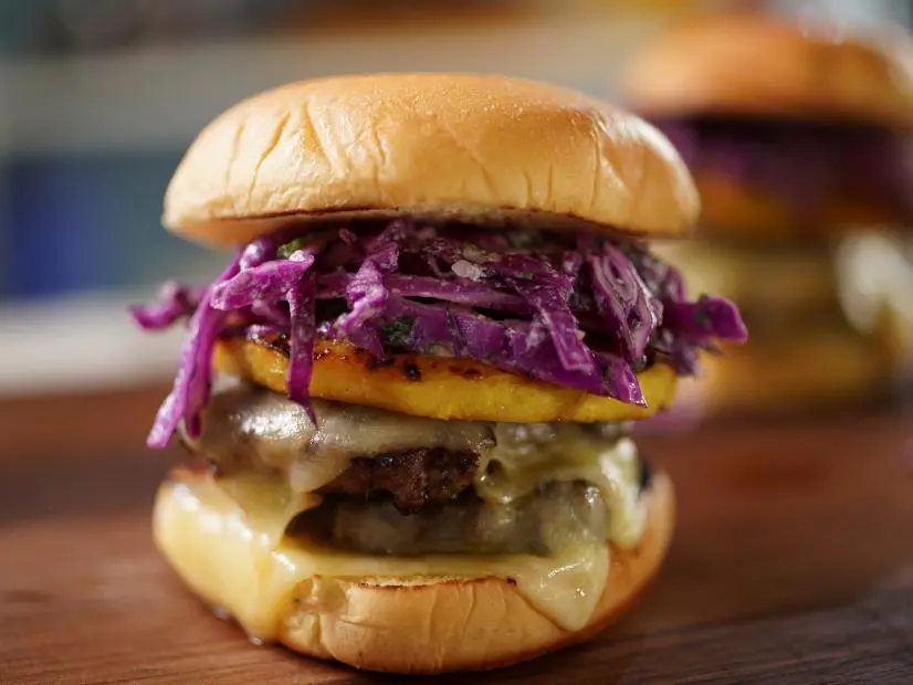 Katie Lee Biegel's Jerk-Style Burgers with Coconut Lime Slaw Beauty, as seen on The Kitchen, Season 34.
