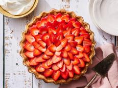 Celebrate juicy, in-season strawberries by using them as a filling for pie. Geoffrey keeps it simple by using store-bough pie crust and filling it with an easy-to-make strawberry compote. Then, he tops everything off with fresh, sliced berries.