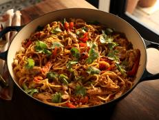 This noodle dish is packed with so much flavor! The peanut sauce is sweet and slightly spicy. It's made with ingredients commonly used in West African peanut sauce, but also includes soy sauce and rice vinegar. When mixed with pasta water the sauce thins out and coats the noodles beautifully. I like to serve this dish warm, but it&rsquo;s also great cold or room temperature.