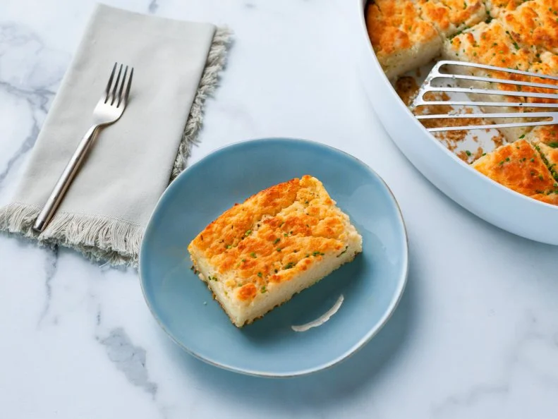 Close-up of Garlic Butter Bath Biscuits, as seen on The Pioneer Woman, season 34.