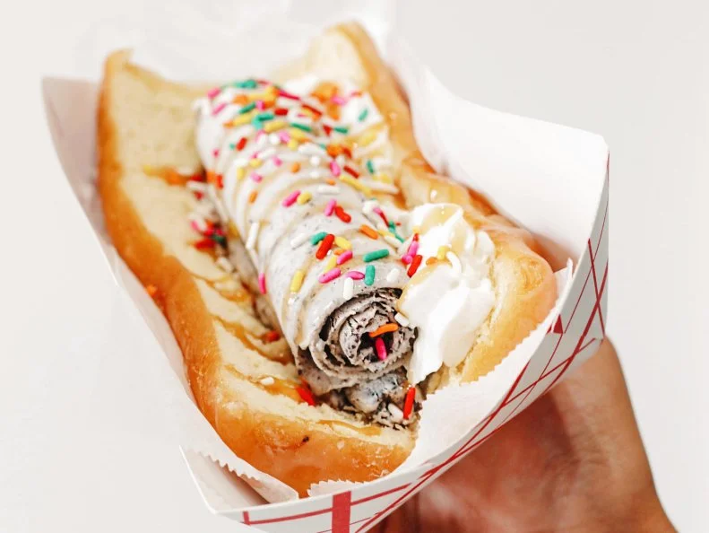 Over-the-Top treat from DELAWARE. Tall Charlie - Rolled ice cream is extra fun when it’s tucked into a glazed doughnut bun at Sweet Charlie’s in Rehoboth Beach.