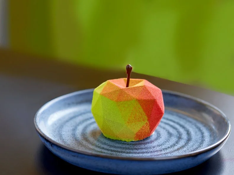 Over-the-Top treat from MASSACHUSETTS. Geometric Apple. The pastry chef at Jonquils Cafe in Boston prints 3D molds to create dramatic treats like this; inside is apple confit and chocolate sponge cake.