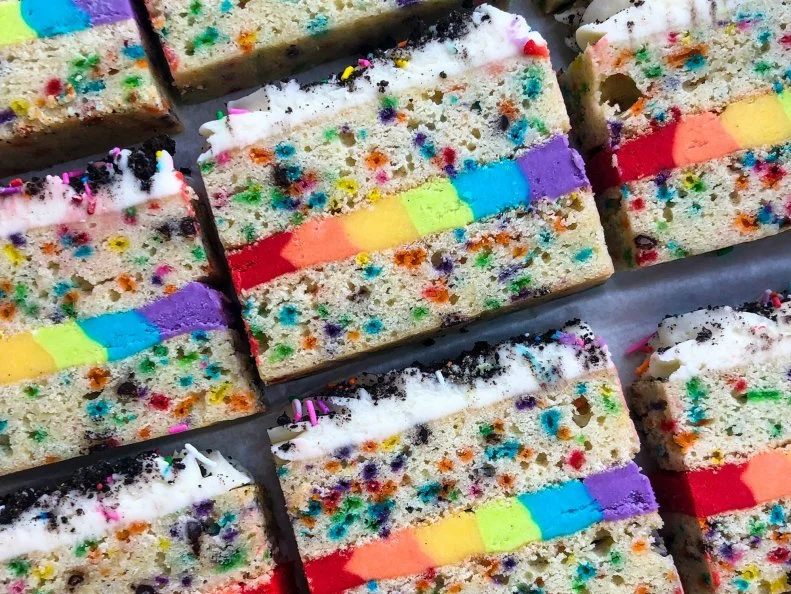 Over-the-Top treat from NEBRASKA. Layered Unicorn Bar. This magical treat at Sweet Magnolias Bake Shop in Omaha is made with confetti blondies and a rainbow of buttercream.