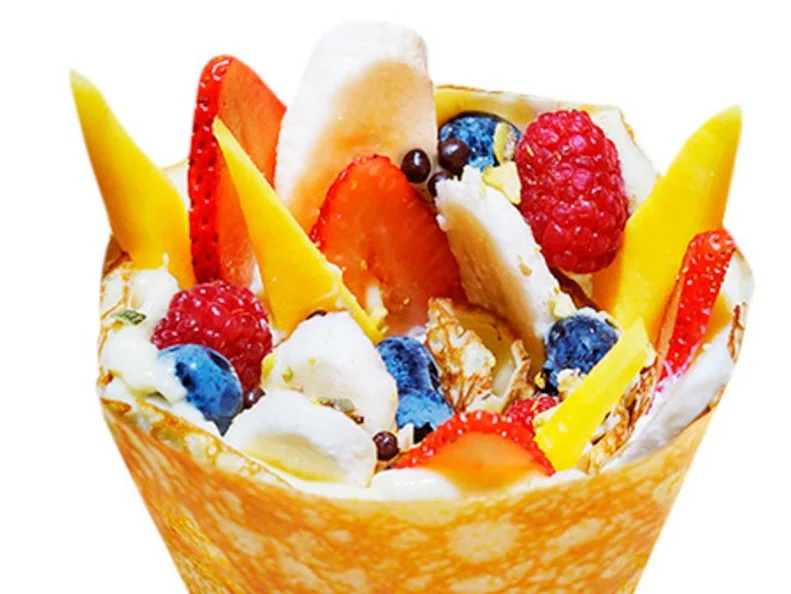 Over-the-Top treat from NORTH DAKOTA. Signature Crêpe. Now that’s a wrap! Custard, fruit and chocolate pearls come nestled in a crêpe cone at Tea and Crepe in Fargo.