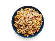 &ldquo;If there&rsquo;s a vegetable that loves the grill, it&rsquo;s corn,&rdquo; Guy says. The chef&rsquo;s go-to method: Grill the corn in the husk so it stays nice and juicy. Just soak it in water first so the husk doesn&rsquo;t scorch on the grill.