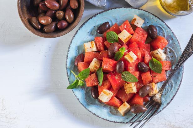 Watermelon salad with grilled halloumi cheese on a plate