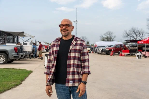 Host Michael Symon at BRISCOE RANCH COOK OFF AT THE CROSSROADS - UVALDE, TX , as seen on BBQ USA, Season 2.