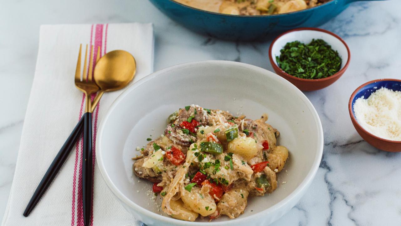 https://food.fnr.sndimg.com/content/dam/images/food/fullset/2023/6/29/WU3409-ree-drummond-chicken-sausage-and-gnocchi_s4x3.jpg.rend.hgtvcom.1280.720.suffix/1688076436362.jpeg