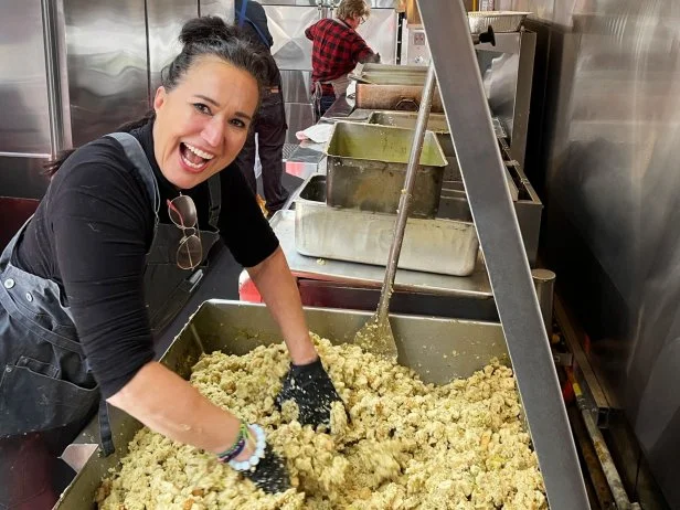 Guy Fieri's Disaster Relief Trailer. Chef Domenica Catelli mixed stuffing at a Thanksgiving event for first responders.