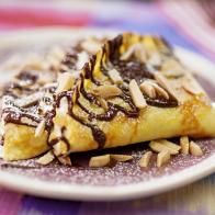 Geoffrey Zakarian's Crepes With Lemon Ricotta and Very Dark Chocolate Beauty, as seen on The Kitchen, Season 34.