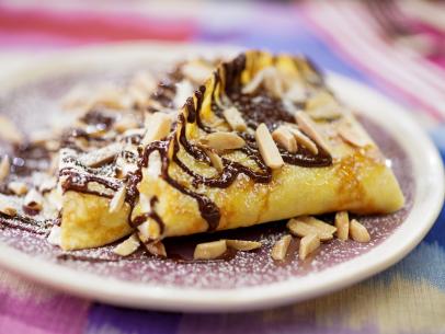 Geoffrey Zakarian's Crepes With Lemon Ricotta and Very Dark Chocolate Beauty, as seen on The Kitchen, Season 34.