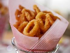 If I see fried calamari on a menu, it's hard to pass it up. A few years ago, Ryan and I took a trip to Sicily and I was surprised to see fried calamari served as a street food. The vendors would fry it and serve it in paper cones, and we would eat it while we walked around sight-seeing. I like using cracker meal to fry seafood in general, and it doesn&rsquo;t disappoint for calamari.