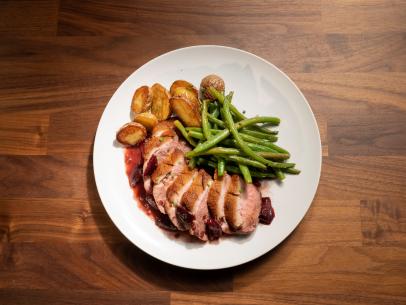 Co-hosts Anne Burrell and Jeff Mauros' duck with string beans and potatoes with cherry sauce, as seen on Worst Cooks In America, Season 26.