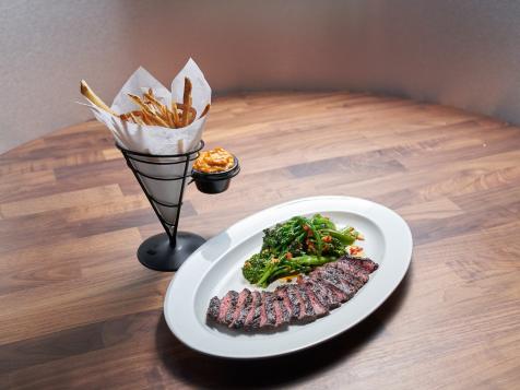 Pepper and Poppy Rubbed Outside Skirt Steaks with Belgian Frites and Broccolini