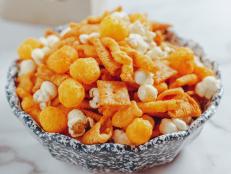This recipe can be made using any of your favorites from the snack or cracker aisles in your supermarket. You could add pretzels, peanuts, cashews, oyster crackers&mdash;anything goes.
