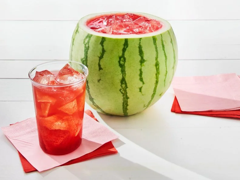 Watermelon-Soju Punch. Cocktail\, alcohol. Carved out watermelon punch bowl. Centerpiece.