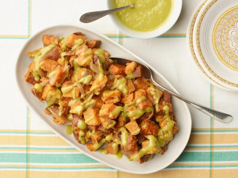 Bobby Flay's Sweet Potato Hash Browns with Green Onion Vinaigrette for the Open House Brunch episode of Brunch @ Bobby's, as seen on Food Network.