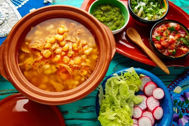 Pozole with mote big corn stew from Mexico with ingredients and appetizer