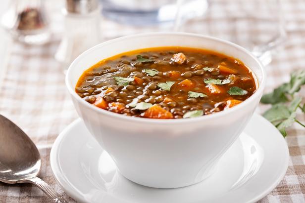 Front view of lentils soup with vegetables