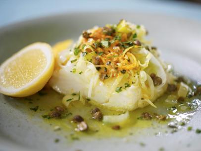 Geoffrey Zakarian's Caper-Herb Butter With Chilean Sea Bass Beauty, as seen on The Kitchen, Season 34.