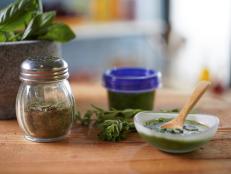 At the end of the season, I often find myself with lots of leftover herbs. A great way to preserve them is by drying them out in the oven and using them to make an herb mix. I pulverize the garlic and zest with a mortar and pestle, but you can use a food processor, too. This method is great for any dried soft or hard herb. Drying times vary depending on your oven, so keep an eye on them. You&rsquo;ll know they&rsquo;re ready when you can crunch them up with your fingers.