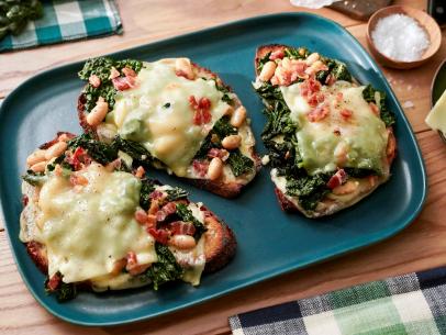 Beauty shot of Molly Yeh's Pancetta, Kale and White Bean Melts, as seen on Girl Meets Farm Season 13