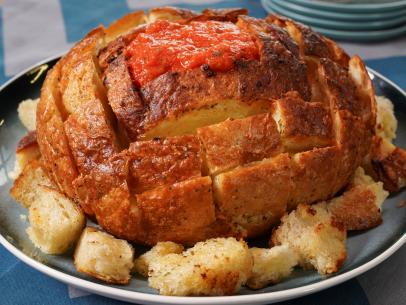 Sunny Anderson's Insta-Famous Cheesy Bread Bowl with Hot Roasted Tomato and Peppers Dip, as seen on The Kitchen, Season 34.