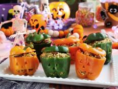 These stuffed peppers are such a fun way to get in the Halloween spirit. I've stuffed them with jambalaya, so in addition to being super cute, they're also super delicious. Use your favorite colors of bell peppers and let your imagination go wild when carving the Jack-O'-Lantern faces.