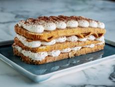 This is a simplified version of the classic Italian dessert. Frozen pound cake replaces ladyfingers and cream cheese replaces mascarpone, making it an easy option if you can&rsquo;t get fancy Italian ingredients at your local store. Just make sure you allow fridge time before you serve!