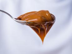 close up of spoon with dulce de leche