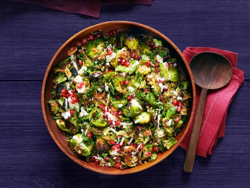 Glazed carrots and pearl onions. roasted brussels sprouts with bulgur and pomegranates. Thanksgiving sides, vegetable dishes.