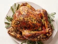 Bobby Flay’s FRESH HERB BUTTER– BASTED TURKEY.