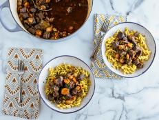 Beef Bourguignon, also known as Beef Burgundy, is a type of beef stew, traditionally cooked in wine from the Burgundy region of France. It is a slow-cooked dish that can be prepared in advance and is great for entertaining.